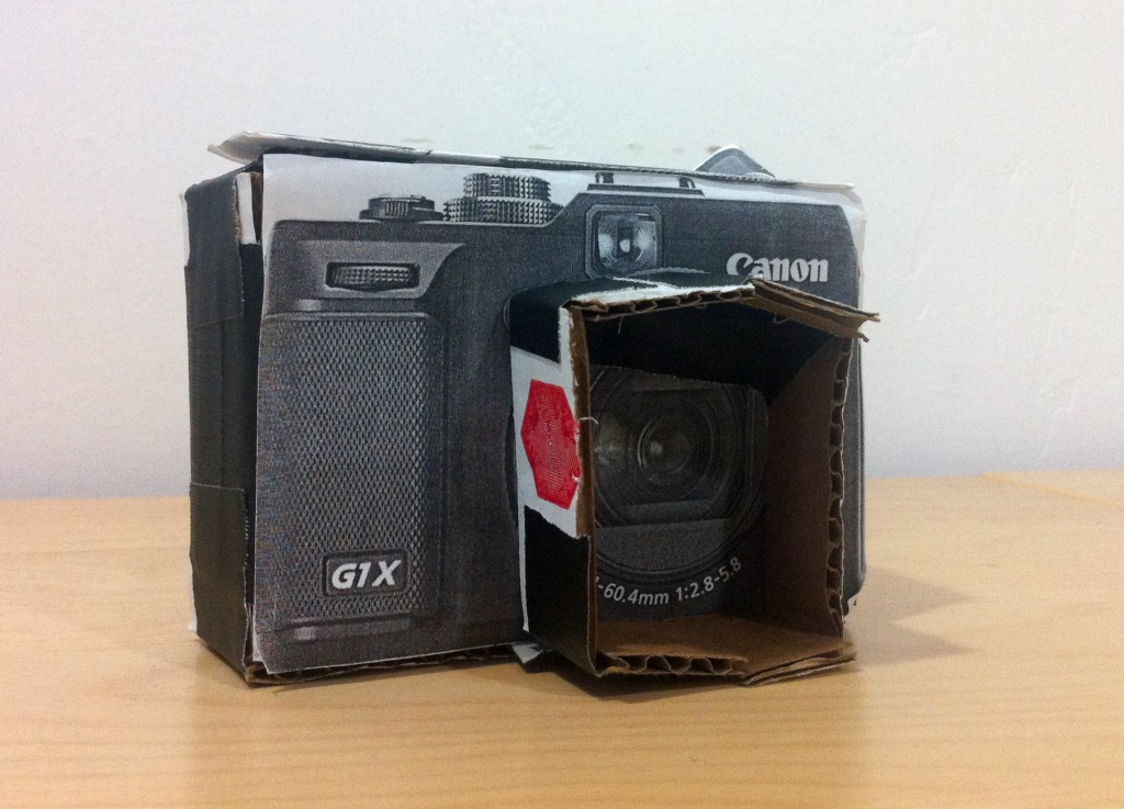 Before the G1X was released, I made a paper mockup of it to gauge its size and weight compared to my phone and DSLR.